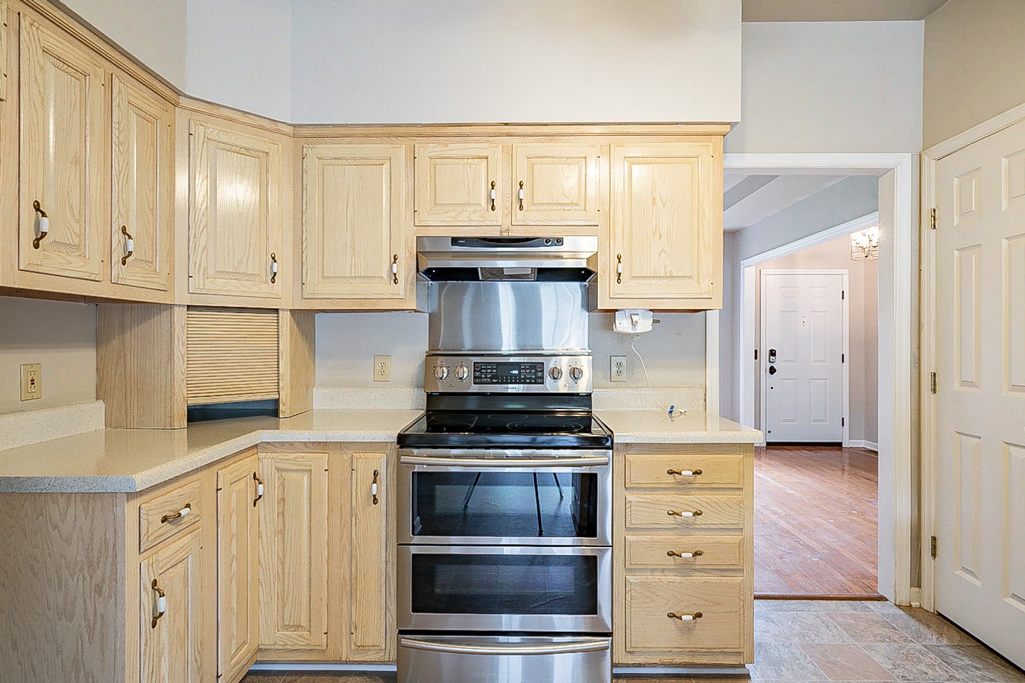 227 Beckwith Road Mount Juliet, TN 37122 - Photo 10 of 34 a kitchen with granite countertop white cabinets and stainless steel appliances