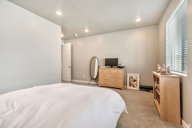 3232 West 1670th Street North Provo, UT 84601 - Photo 14 of 33 Carpeted bedroom featuring recessed lighting and a textured ceiling