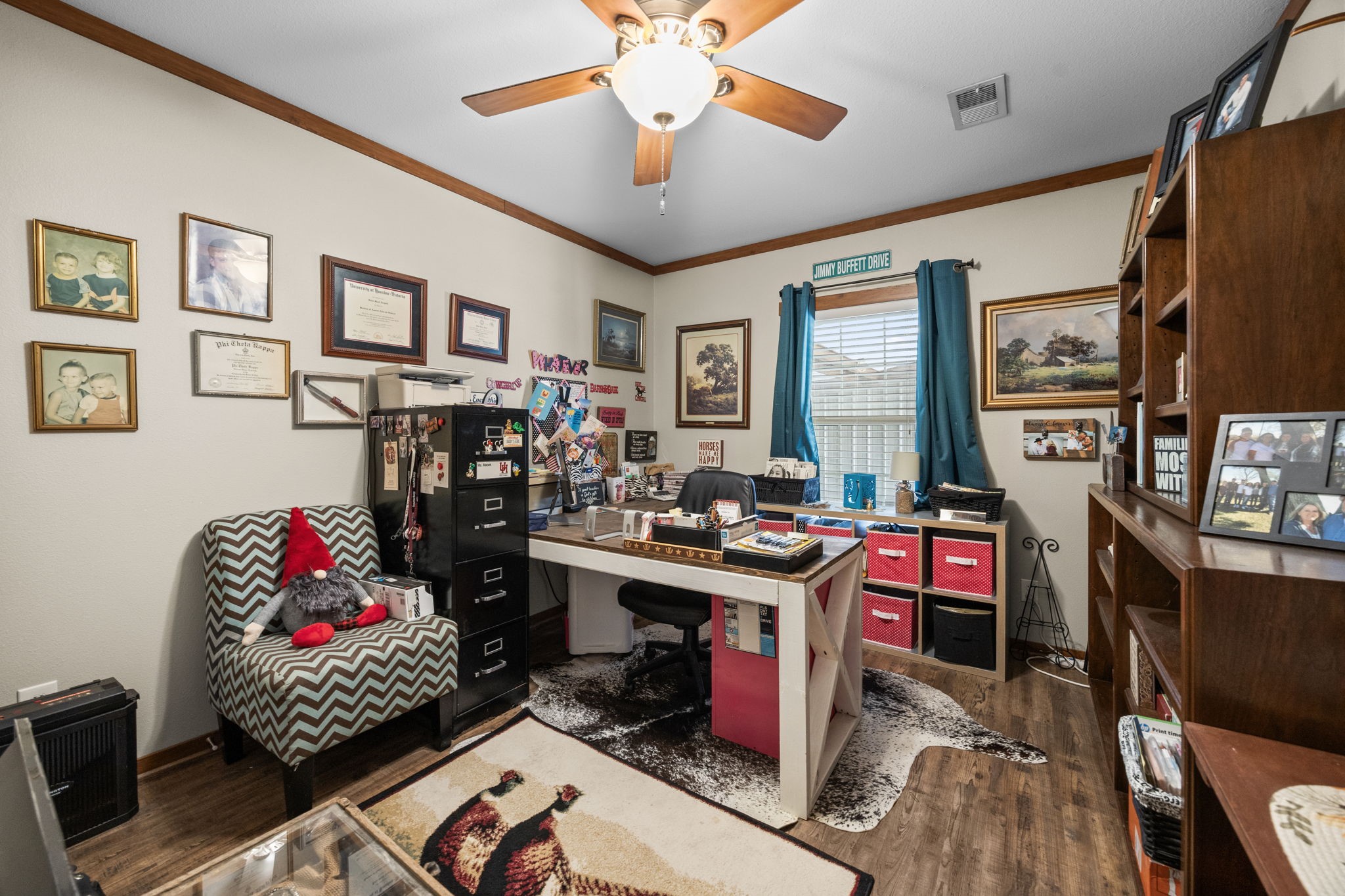 3518 Oil Field Road Bellville, TX 77418 - Photo 20 of 40 a living room with furniture and a flat screen tv