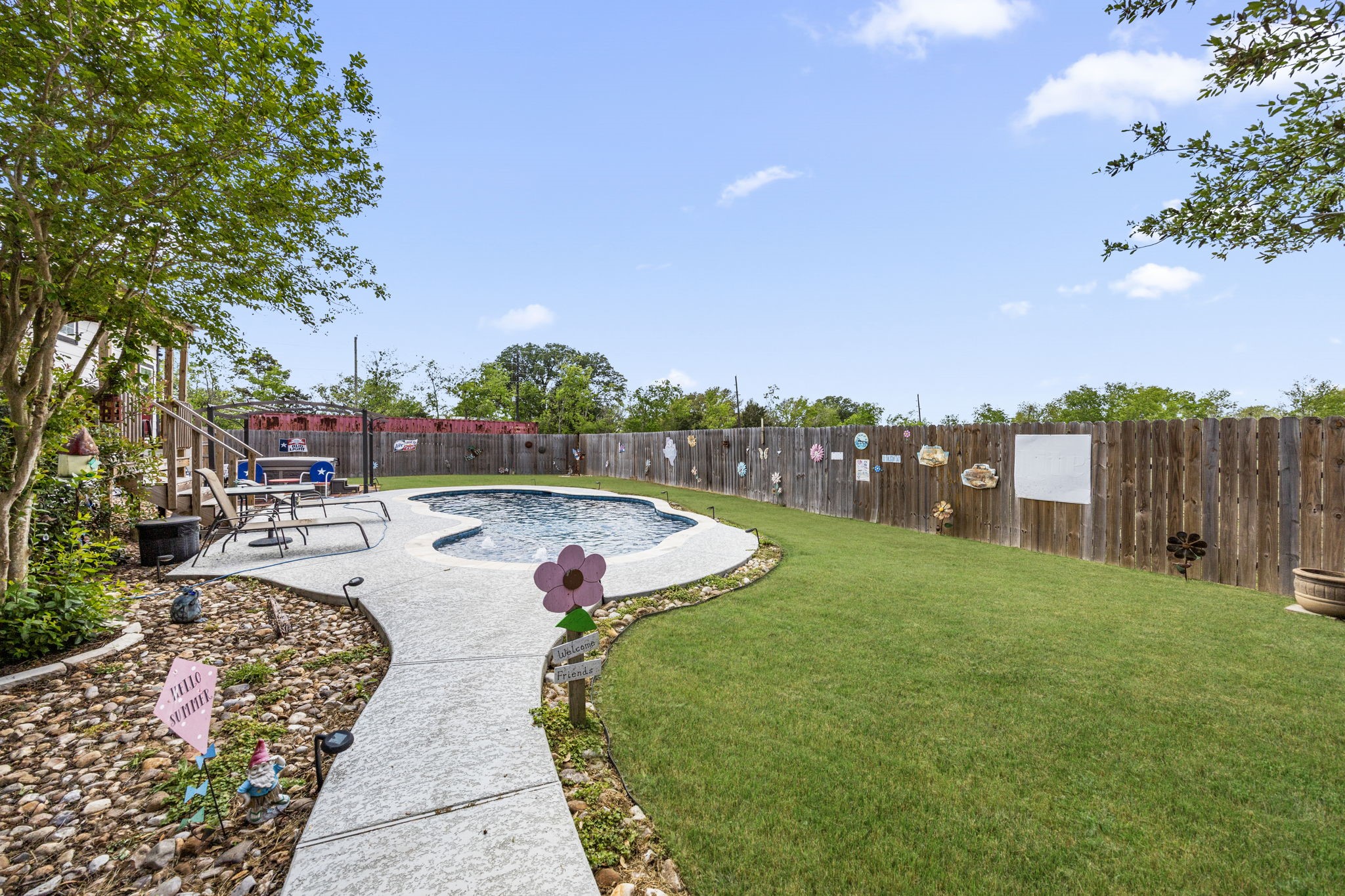 3518 Oil Field Road Bellville, TX 77418 - Photo 24 of 40 a view of a backyard with sitting area