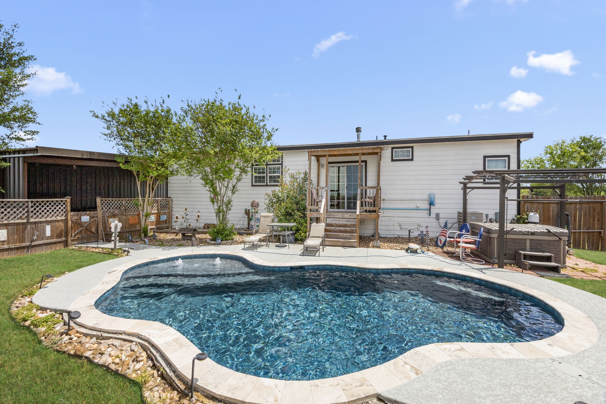 3518 Oil Field Road Bellville, TX 77418 - Photo 28 of 40 a view of a house with backyard