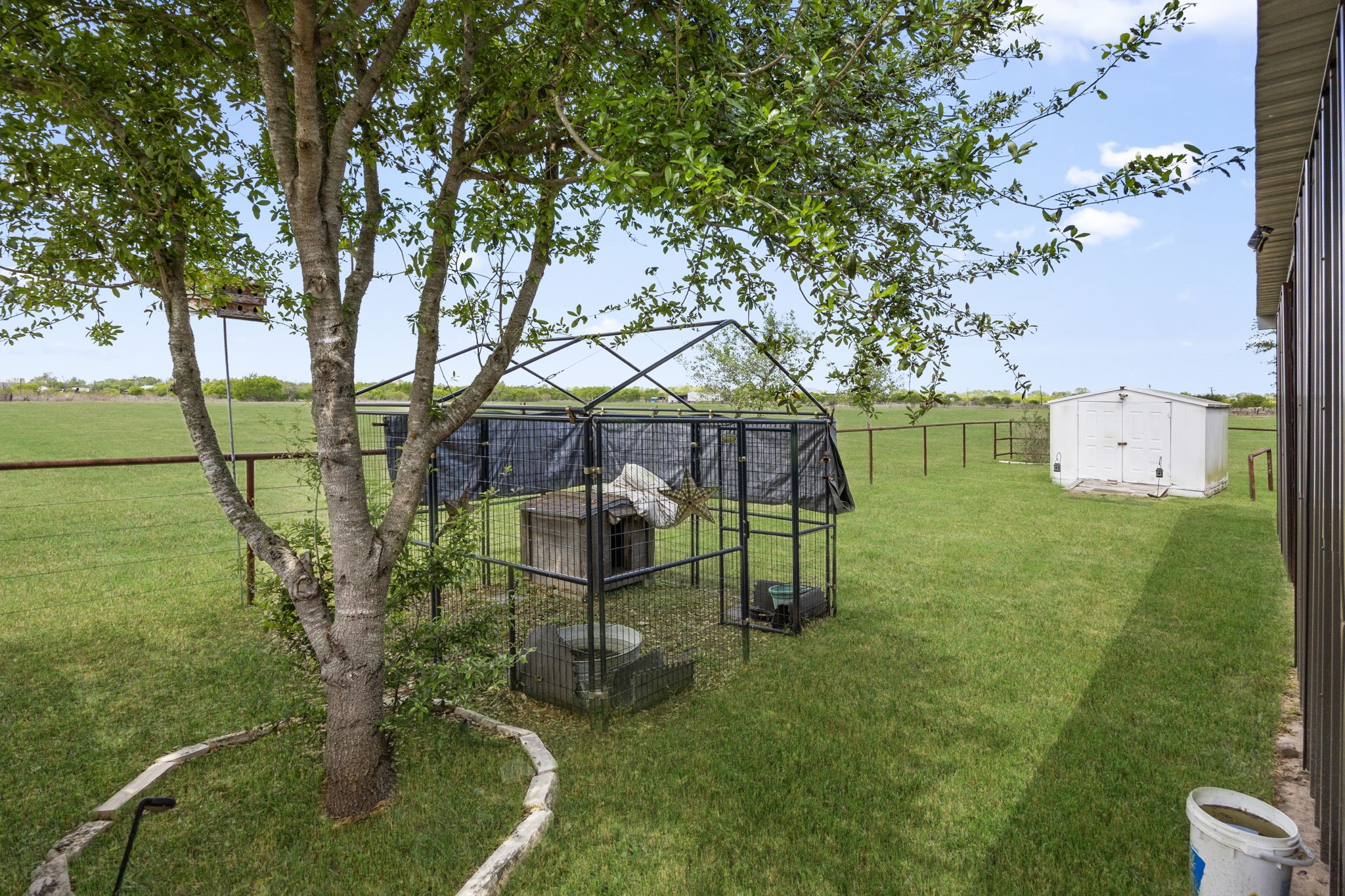 3518 Oil Field Road Bellville, TX 77418 - Photo 31 of 40 an aerial view of a house with garden space and street view