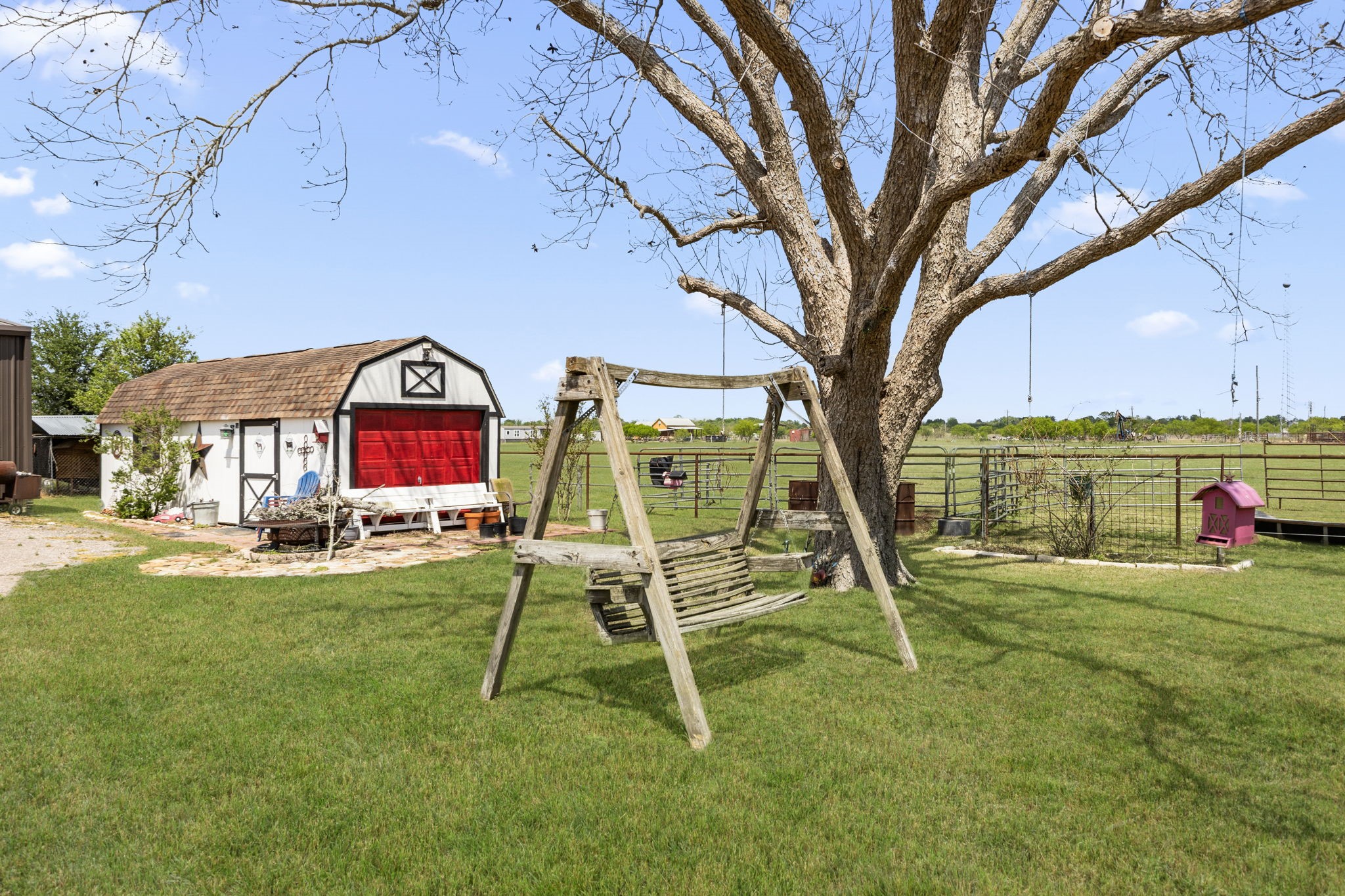 3518 Oil Field Road Bellville, TX 77418 - Photo 5 of 40 a view of a swimming pool with a yard