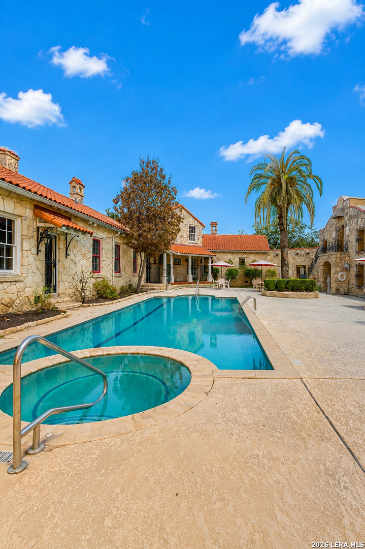 6160 Eckhert Road, Unit 804 San Antonio, TX 78240 - Photo 33 of 38 a view of swimming pool with a yard and plants