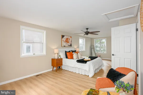 a view of a livingroom with furniture and windows