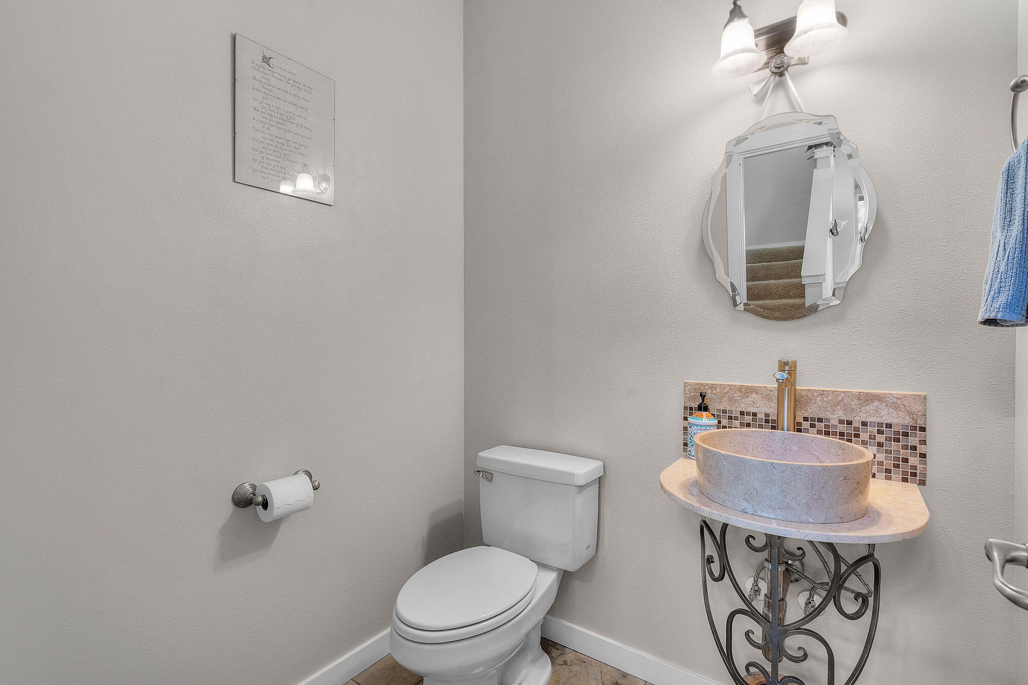 10870 Village Loop Redmond, OR 97756 - Photo 15 of 35 a bathroom with a toilet sink and mirror