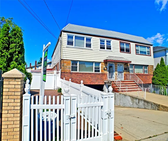 a front view of a house with a porch