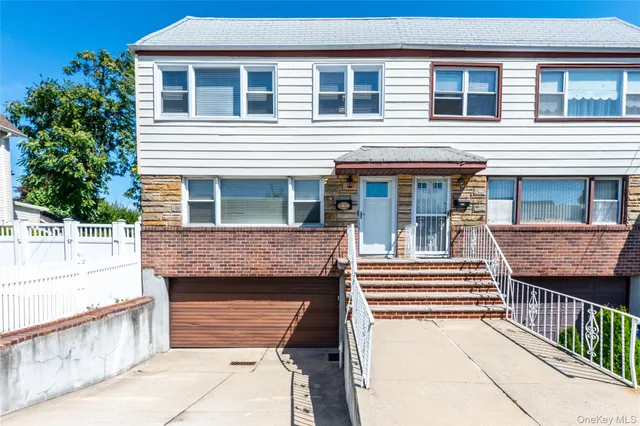 a front view of a house with a balcony