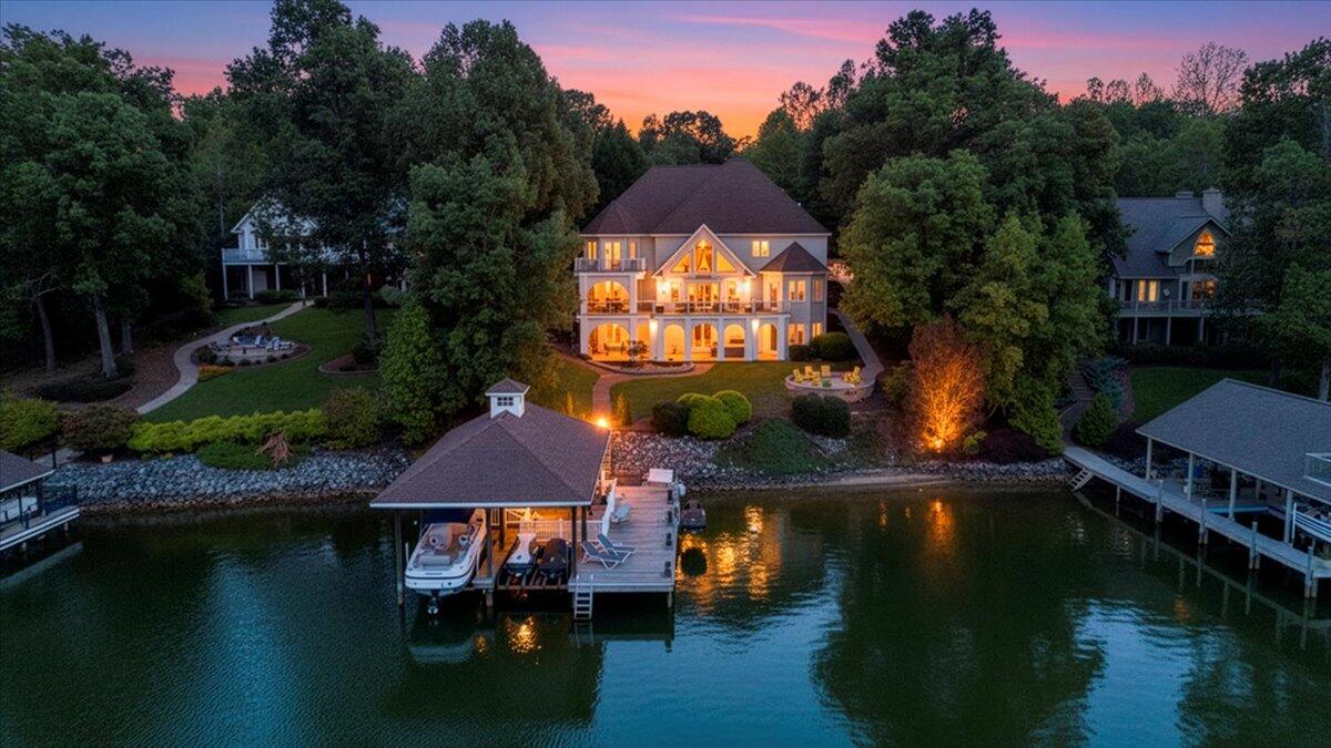 2580 Lakewood Forest Road Moneta, VA 24121 - Photo 102 of 103 a view of a lake with a house in the background