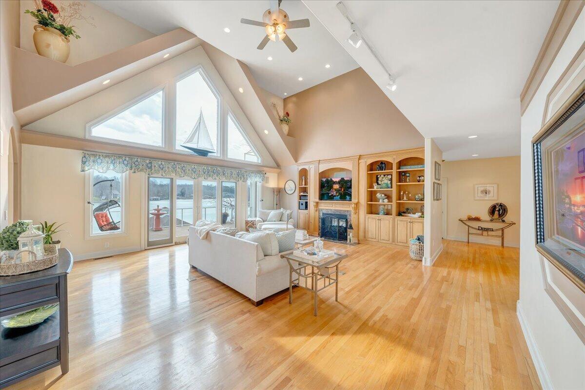 2580 Lakewood Forest Road Moneta, VA 24121 - Photo 31 of 103 a living room with fireplace furniture and a large window