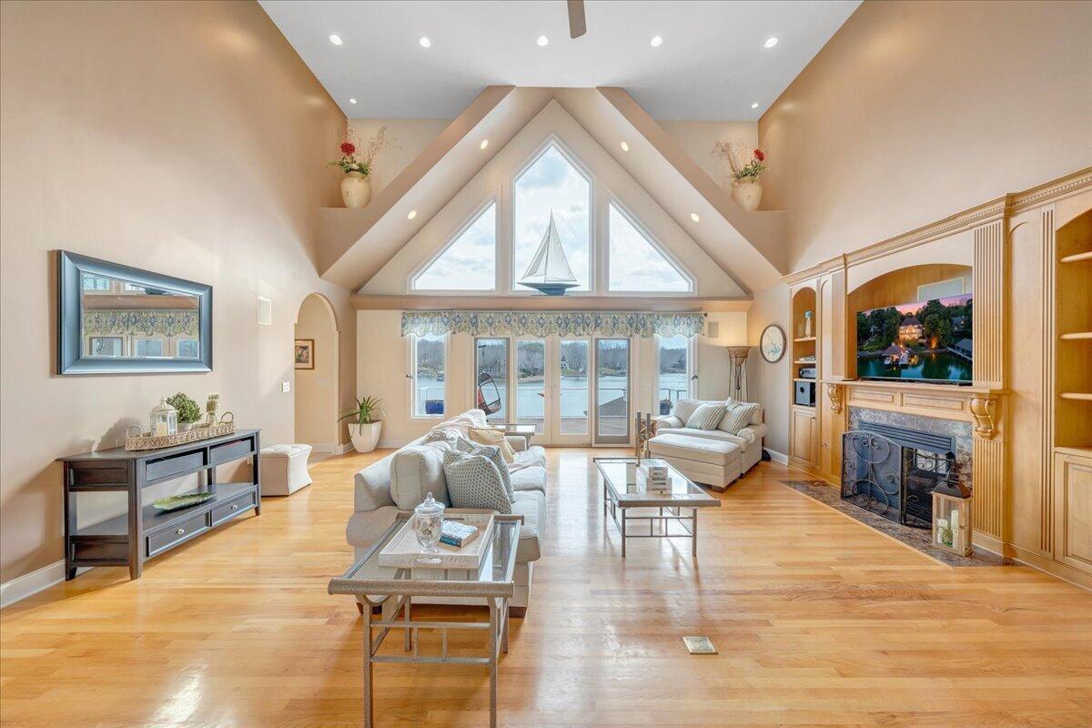2580 Lakewood Forest Road Moneta, VA 24121 - Photo 32 of 103 a living room with fireplace furniture and a large window