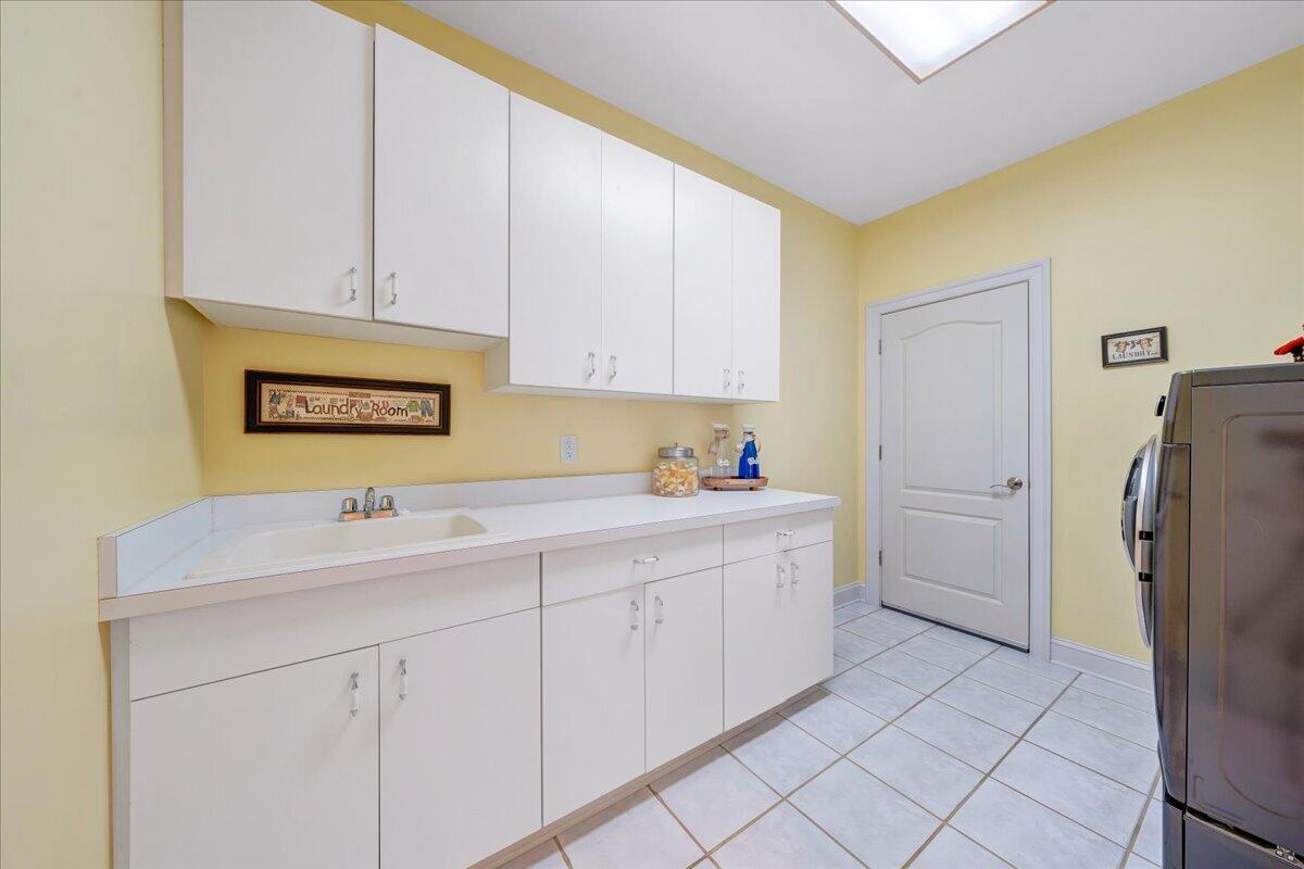 2580 Lakewood Forest Road Moneta, VA 24121 - Photo 48 of 103 a kitchen with a sink cabinets and refrigerator