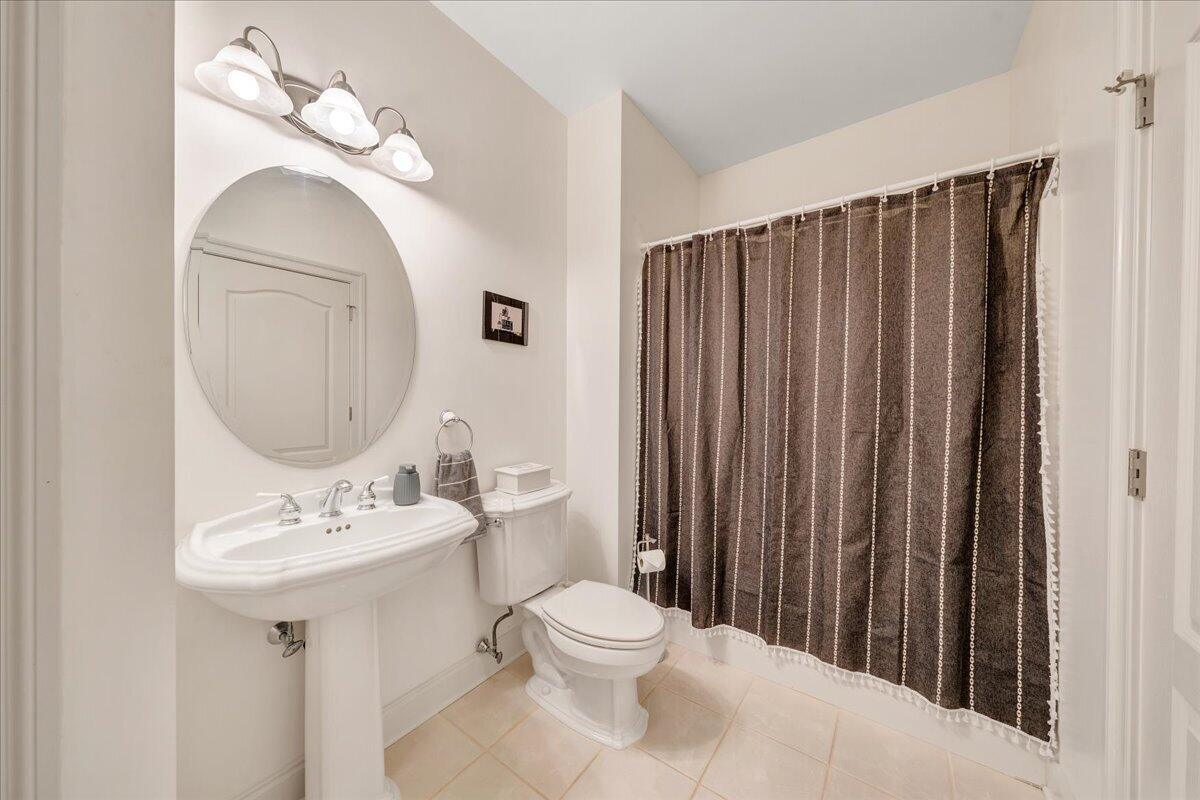 2580 Lakewood Forest Road Moneta, VA 24121 - Photo 50 of 103 a bathroom with a toilet sink and mirror