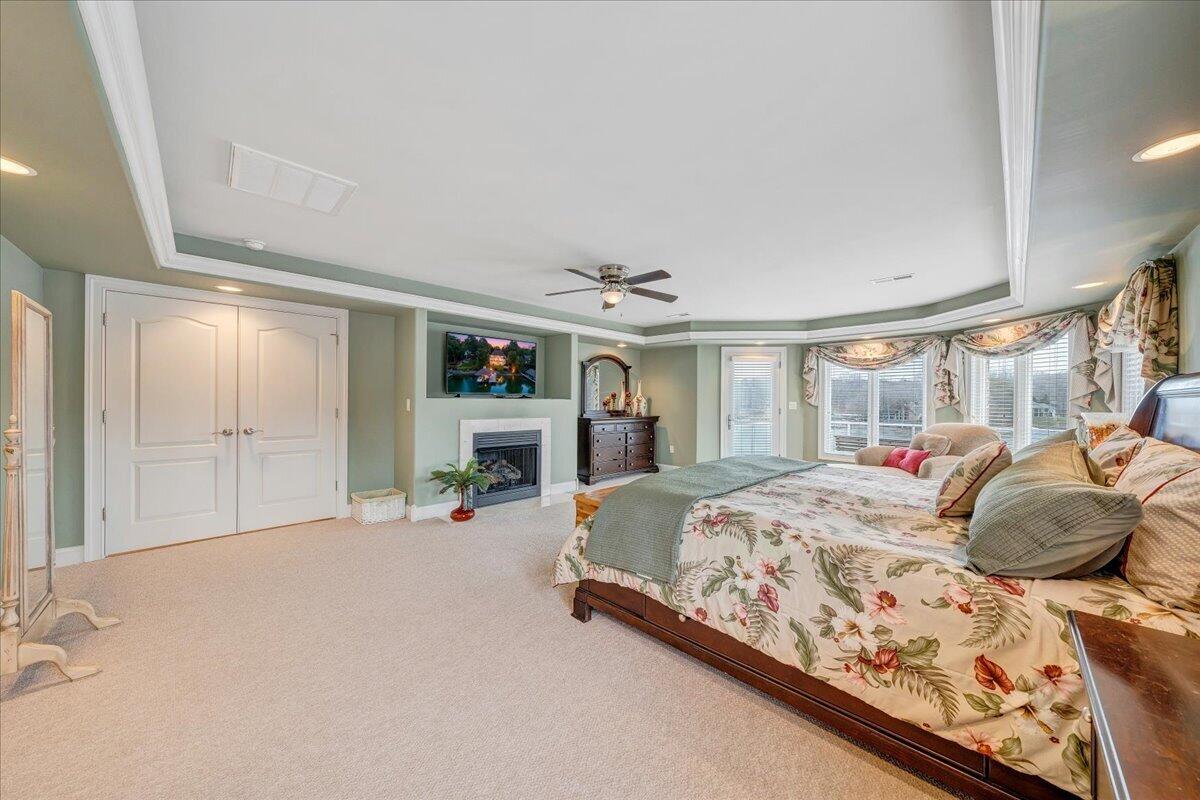 2580 Lakewood Forest Road Moneta, VA 24121 - Photo 54 of 103 a bedroom with a bed couch and a window