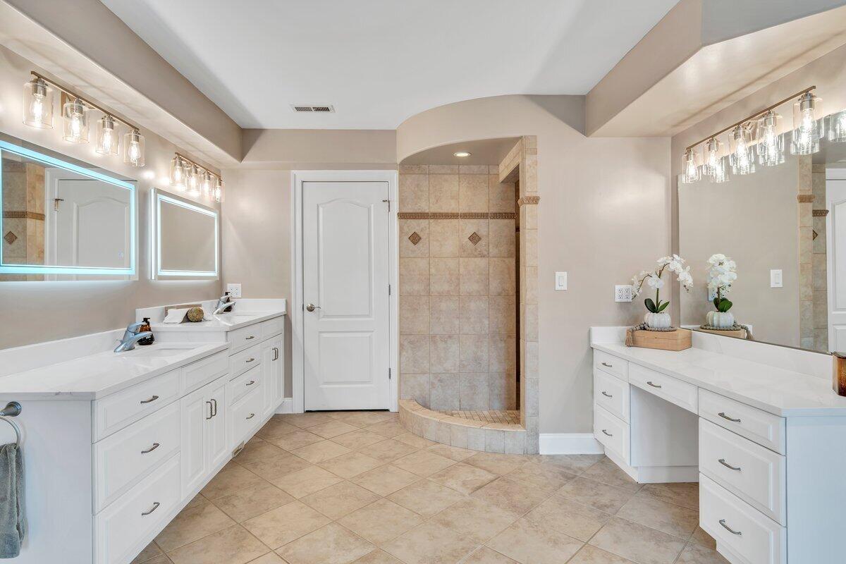 2580 Lakewood Forest Road Moneta, VA 24121 - Photo 58 of 103 a spacious bathroom with a granite countertop sink mirror and a