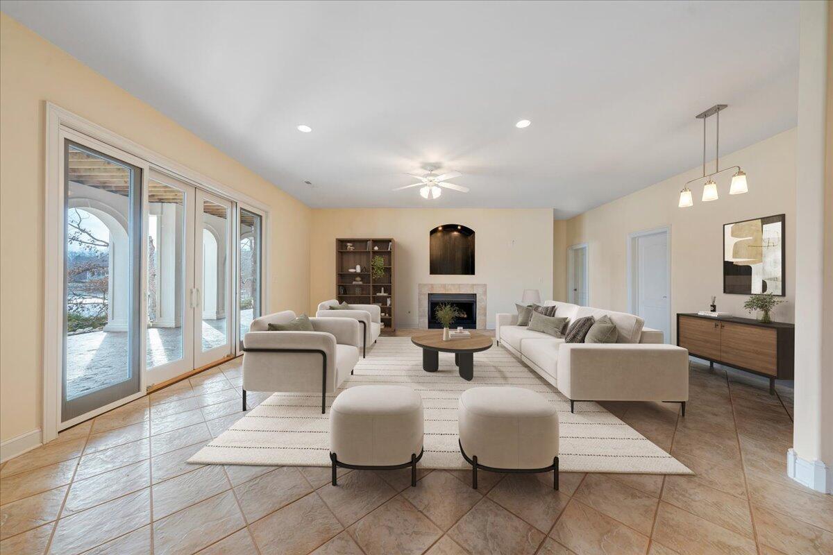 2580 Lakewood Forest Road Moneta, VA 24121 - Photo 78 of 103 a living room with fireplace furniture and a large window