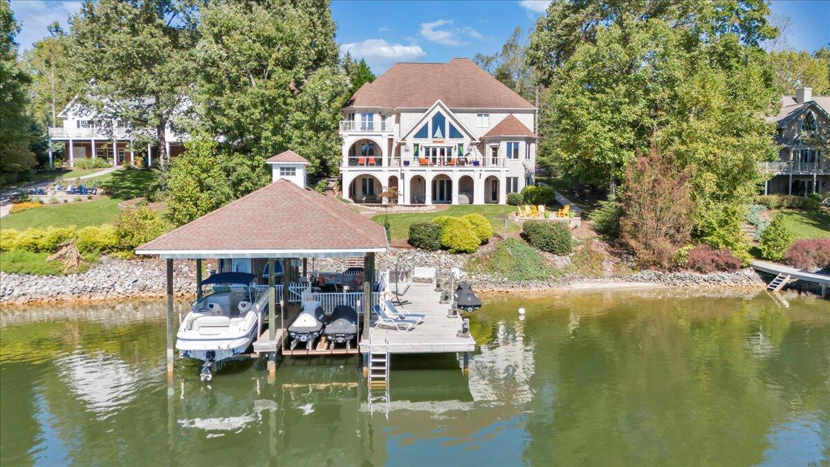 2580 Lakewood Forest Road Moneta, VA 24121 - Photo 96 of 103 a front view of a house with a boat