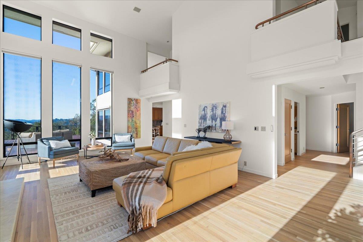 7 No Name Road Los Gatos, CA 95033 - Photo 12 of 49 a living room with fireplace furniture and a large window