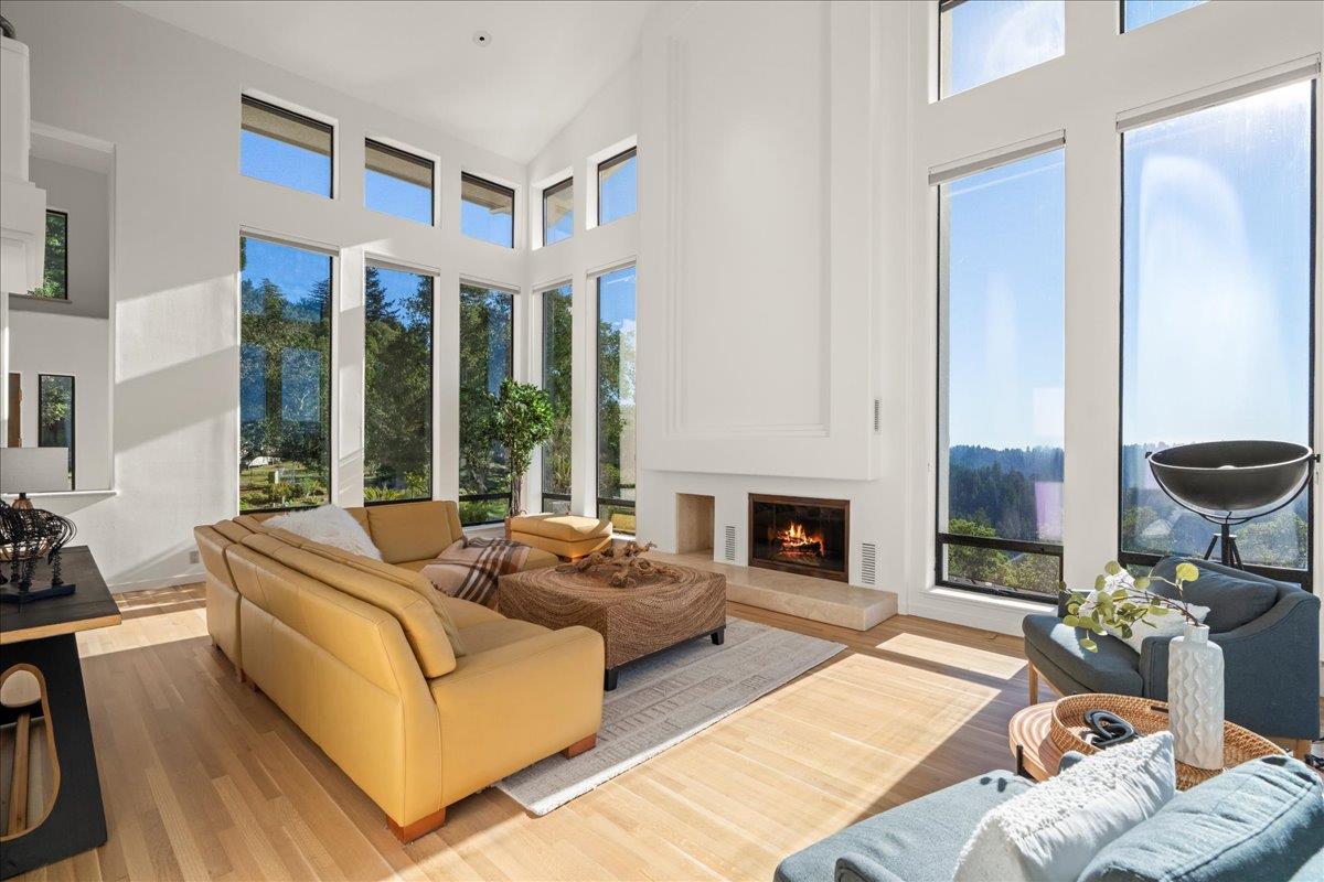 7 No Name Road Los Gatos, CA 95033 - Photo 13 of 49 a living room with furniture and a fireplace
