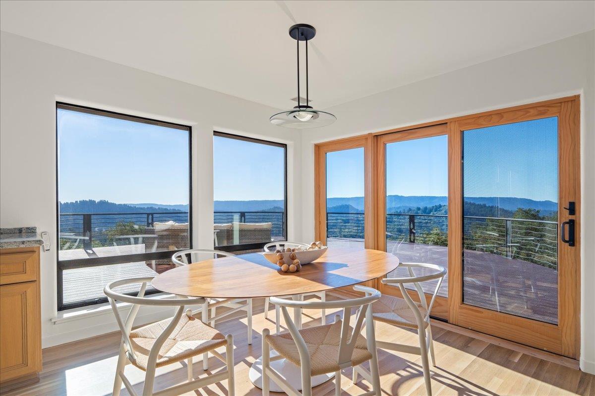 7 No Name Road Los Gatos, CA 95033 - Photo 17 of 49 a dining room with a table and chairs