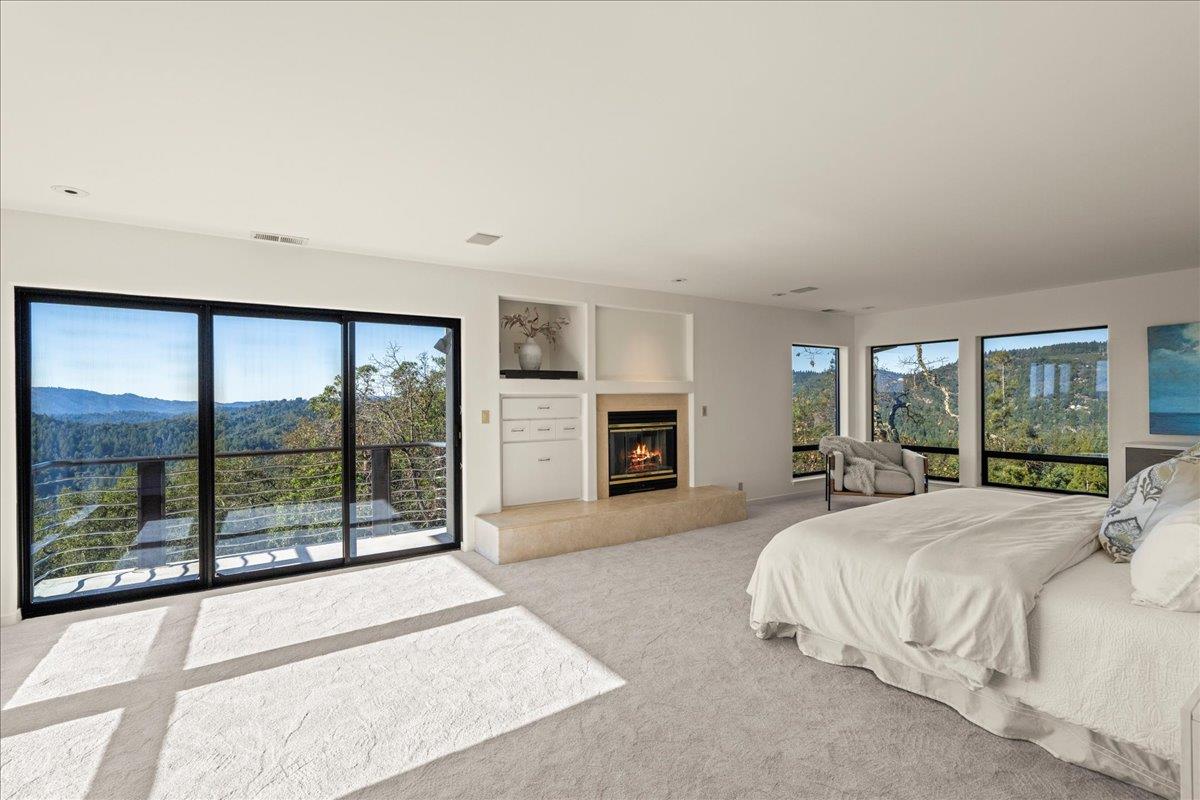 7 No Name Road Los Gatos, CA 95033 - Photo 26 of 49 a large bedroom with a large bed and a large window