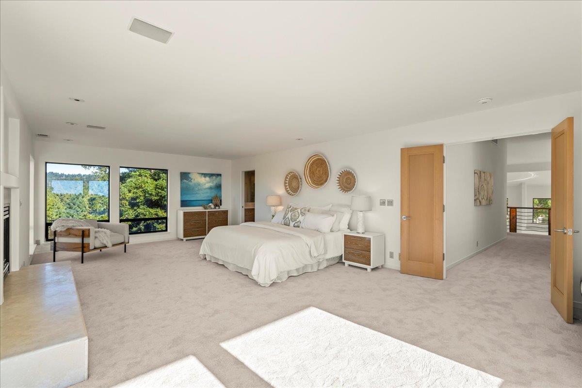 7 No Name Road Los Gatos, CA 95033 - Photo 27 of 49 a bedroom with a large bed and large windows