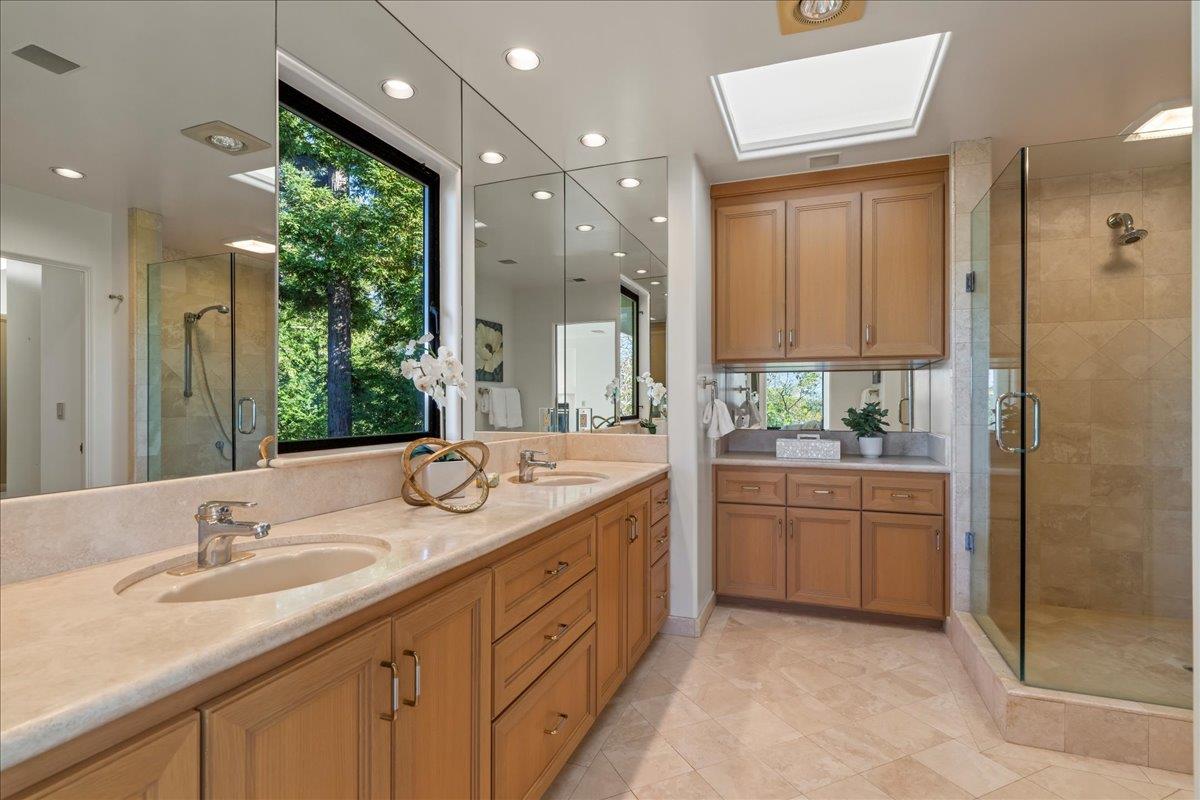 7 No Name Road Los Gatos, CA 95033 - Photo 29 of 49 a bathroom with a granite countertop sink and a mirror