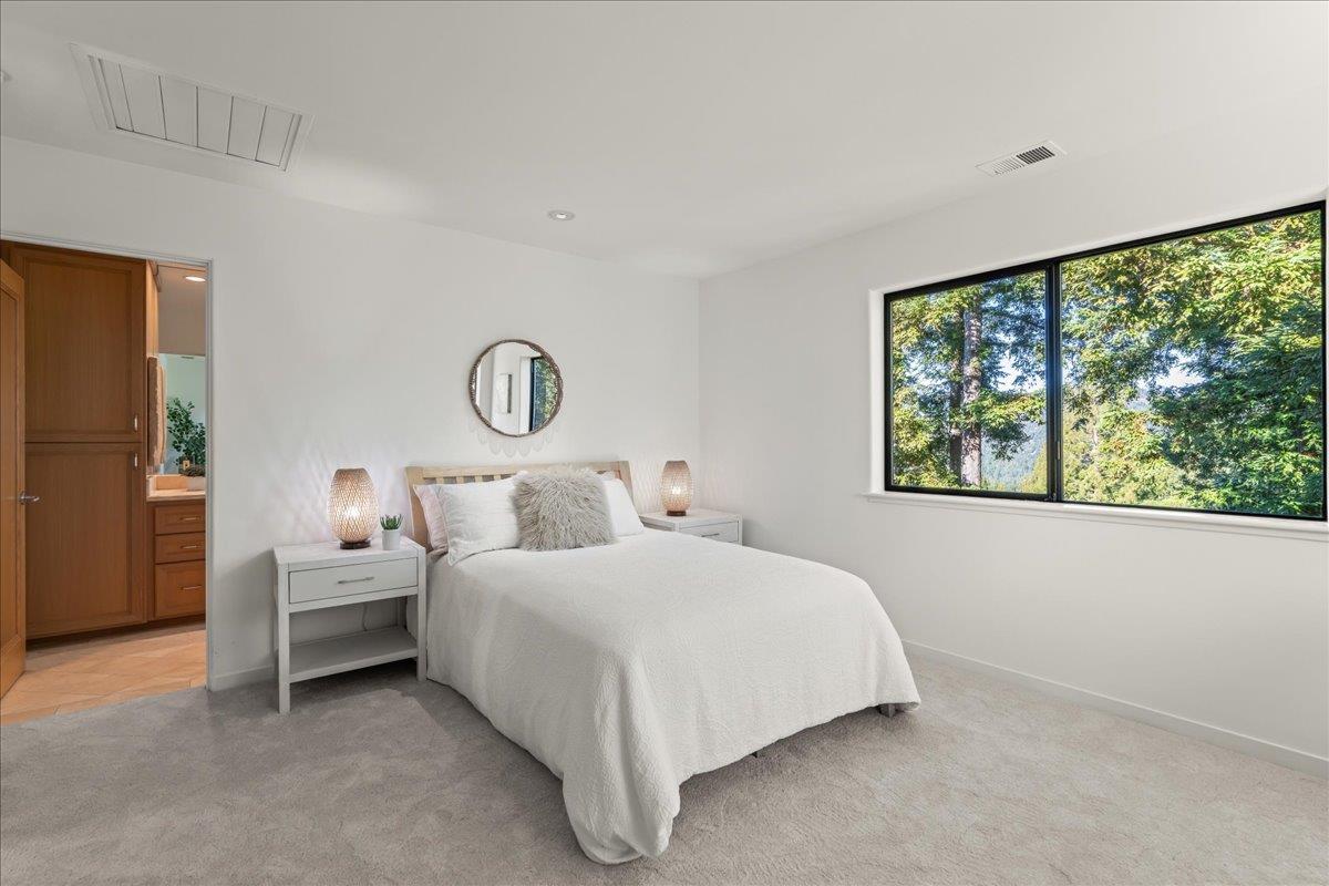 7 No Name Road Los Gatos, CA 95033 - Photo 34 of 49 a bedroom with a bed and a large window