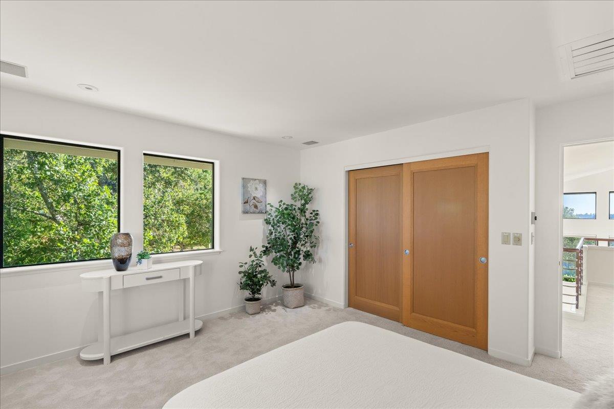 7 No Name Road Los Gatos, CA 95033 - Photo 35 of 49 a living room with a potted plant and windows