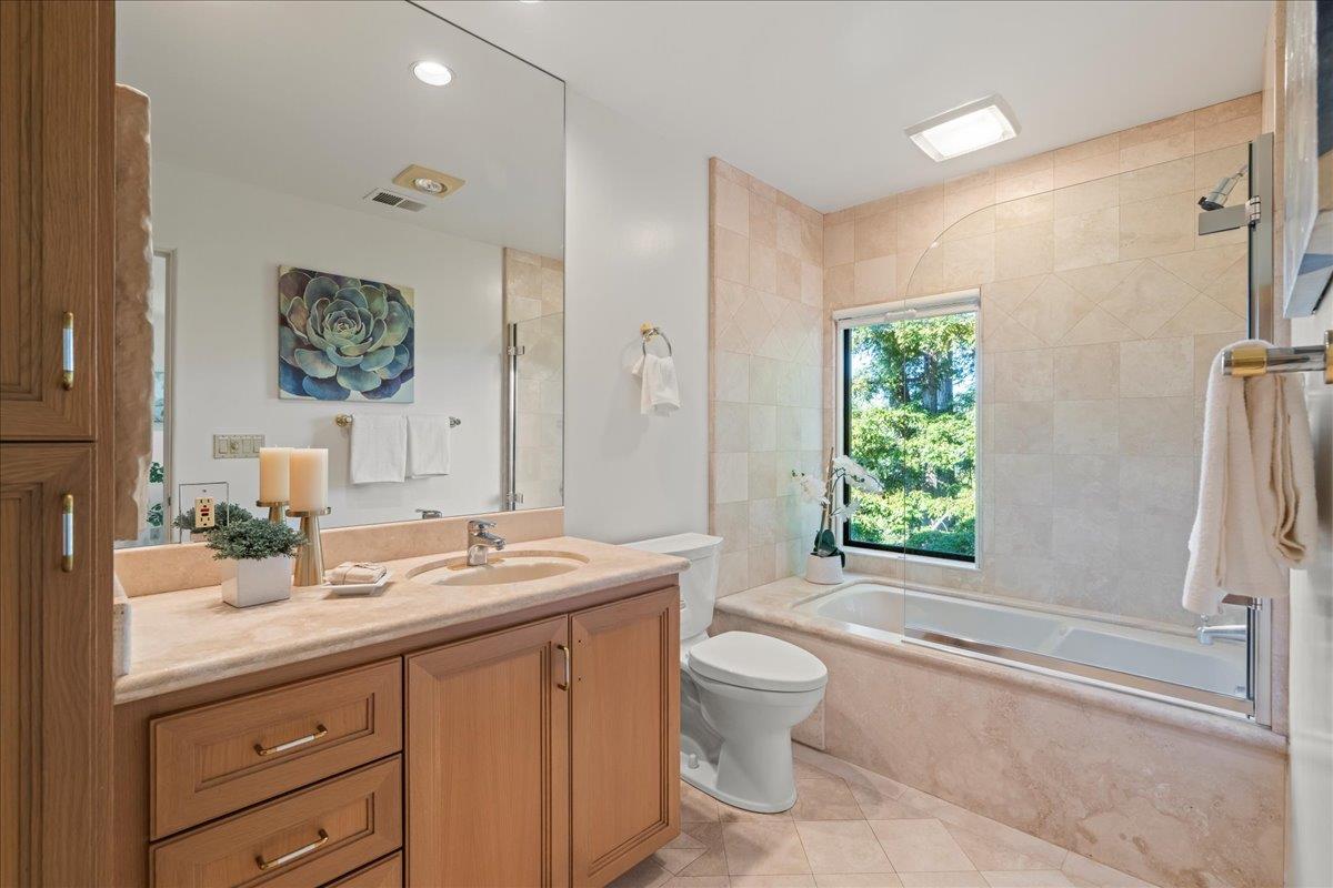 7 No Name Road Los Gatos, CA 95033 - Photo 36 of 49 a bathroom with a granite countertop sink toilet and shower