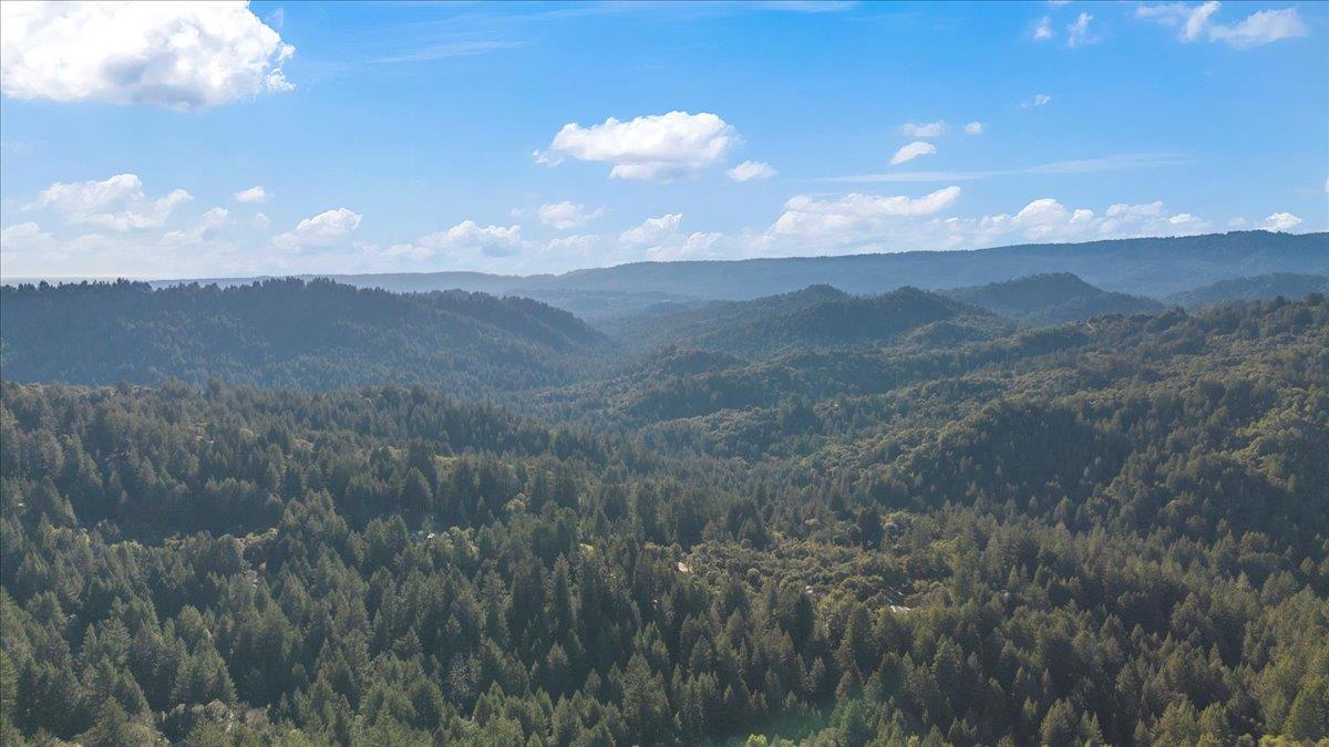 7 No Name Road Los Gatos, CA 95033 - Photo 40 of 49 a view of a town with mountains in the background