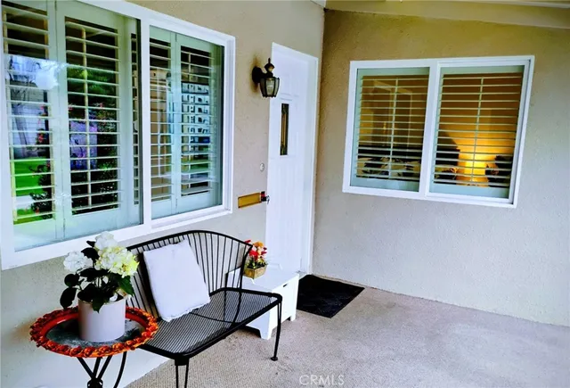 a view of a balcony with a lounge chair