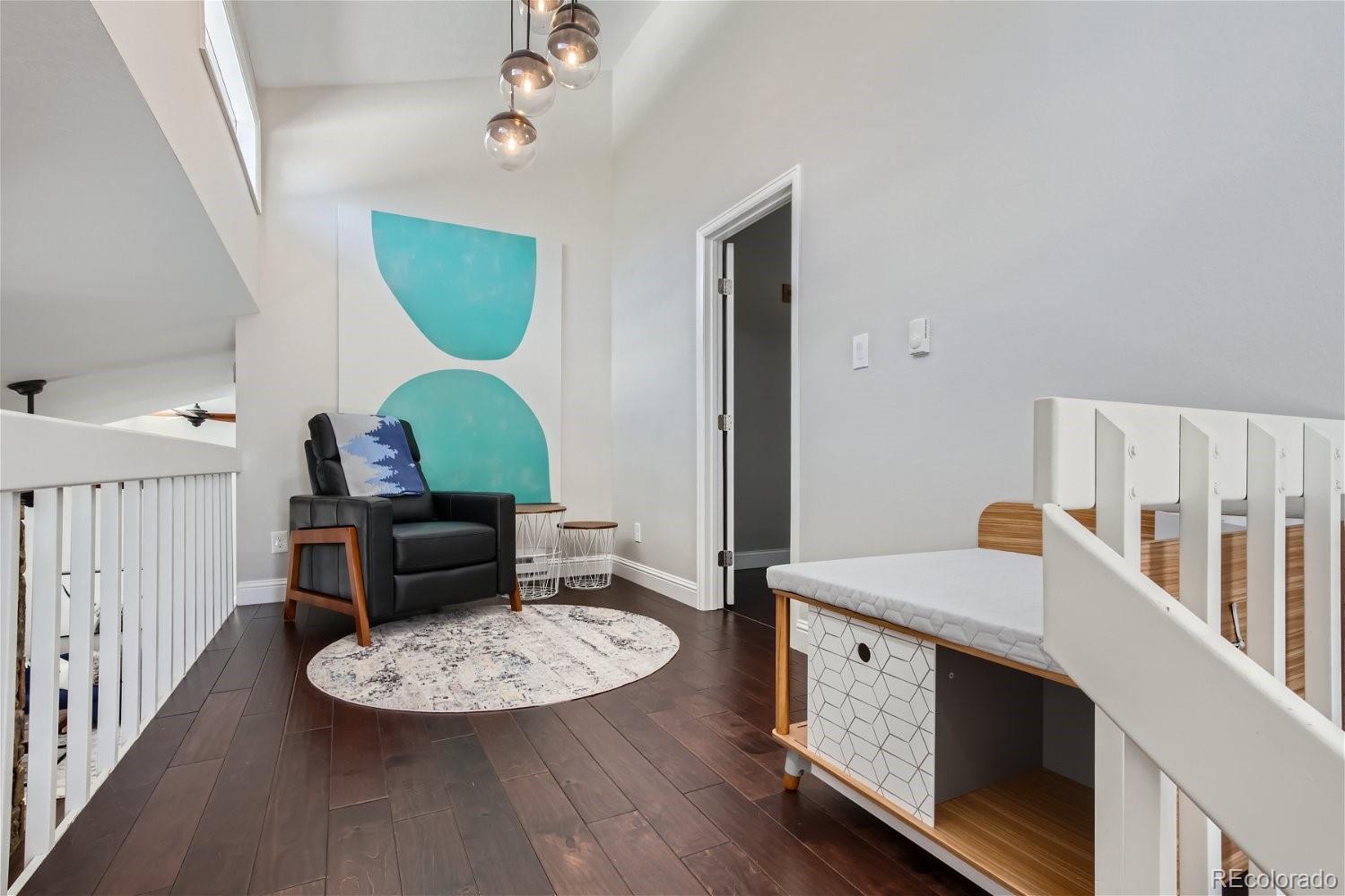 27732 Squaw Pass Road Evergreen, CO 80439 - Photo 18 of 33 a living room with furniture