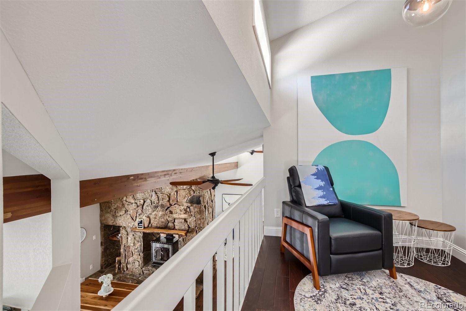 27732 Squaw Pass Road Evergreen, CO 80439 - Photo 19 of 33 a view of a livingroom with furniture and windows