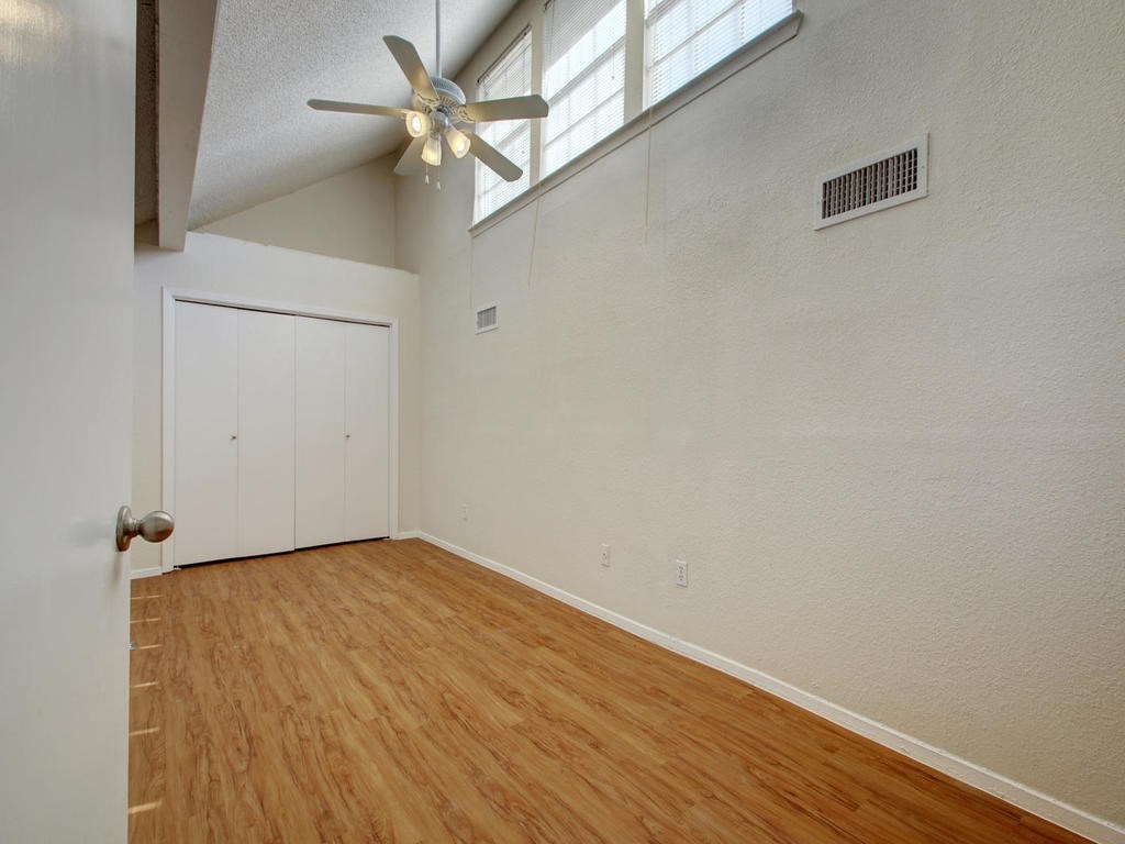 4906 Duval Street, Unit A Austin, TX 78751 - Photo 16 of 24 wooden floor in a hall with an entryway