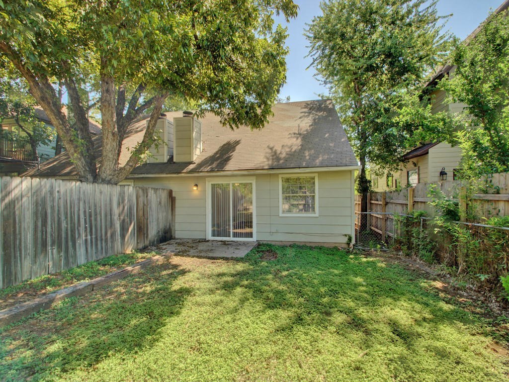 4906 Duval Street, Unit A Austin, TX 78751 - Photo 20 of 24 a view of a house with a yard