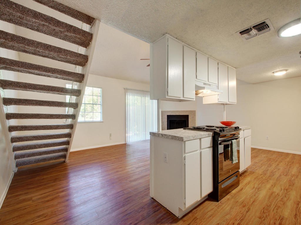 4906 Duval Street, Unit A Austin, TX 78751 - Photo 2 of 24 a kitchen with a stove and a kitchen
