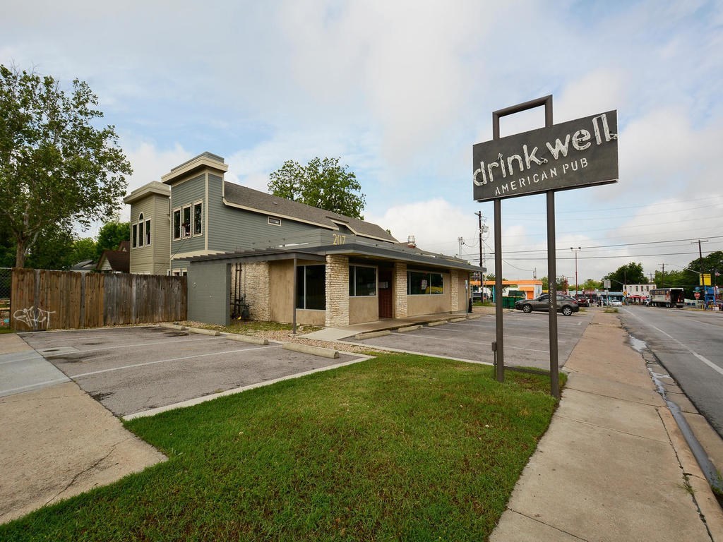 4906 Duval Street, Unit A Austin, TX 78751 - Photo 22 of 24 a front view of a house with garden