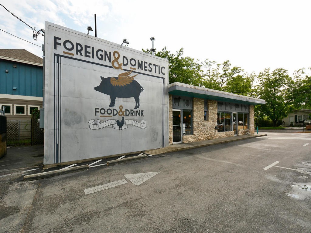 4906 Duval Street, Unit A Austin, TX 78751 - Photo 23 of 24 a view of a house with roof and parking area