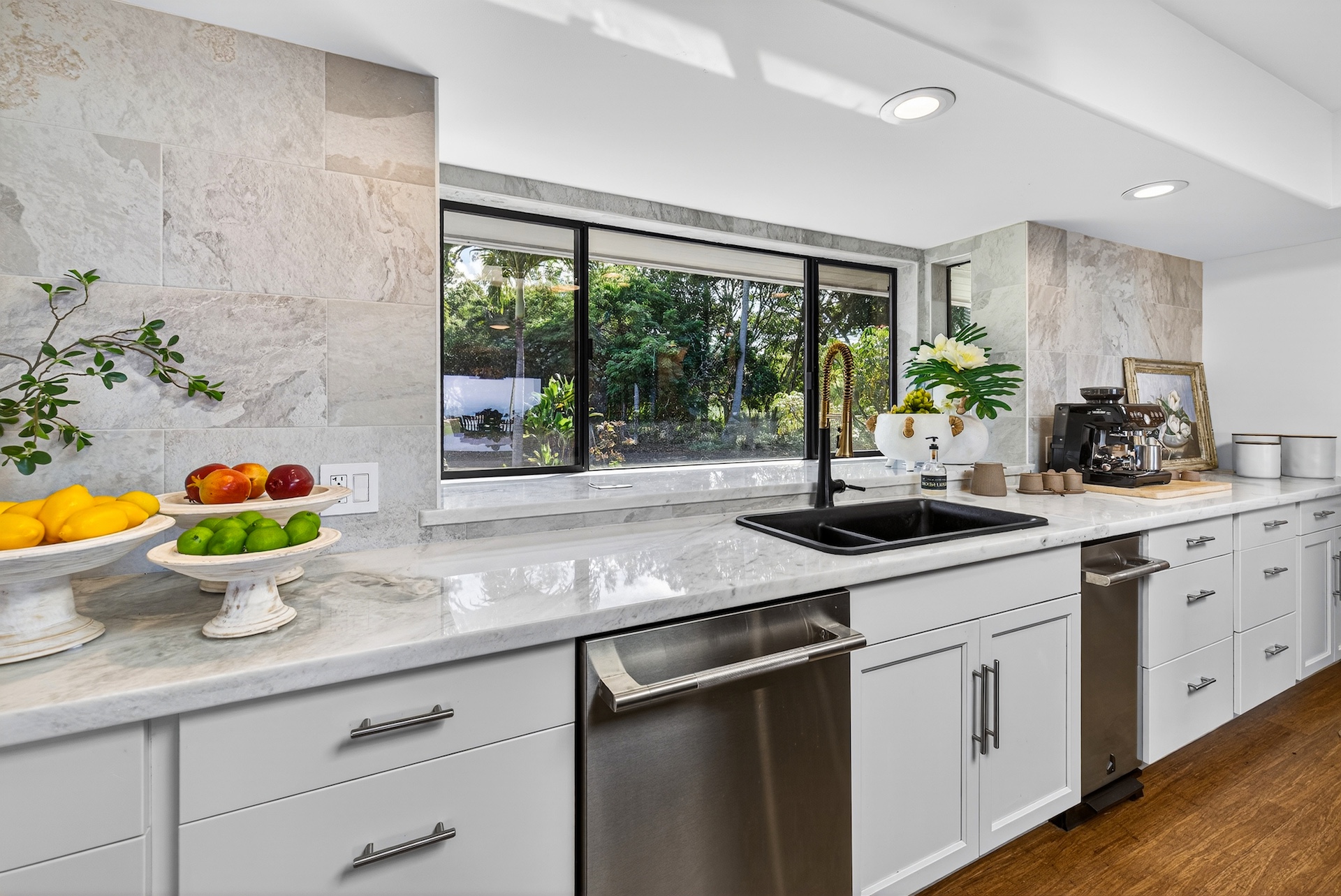 56-2878 Puakea Bay Road Kamuela, HI 96743 - Photo 13 of 25 a kitchen with stainless steel appliances a sink a counter space and a window