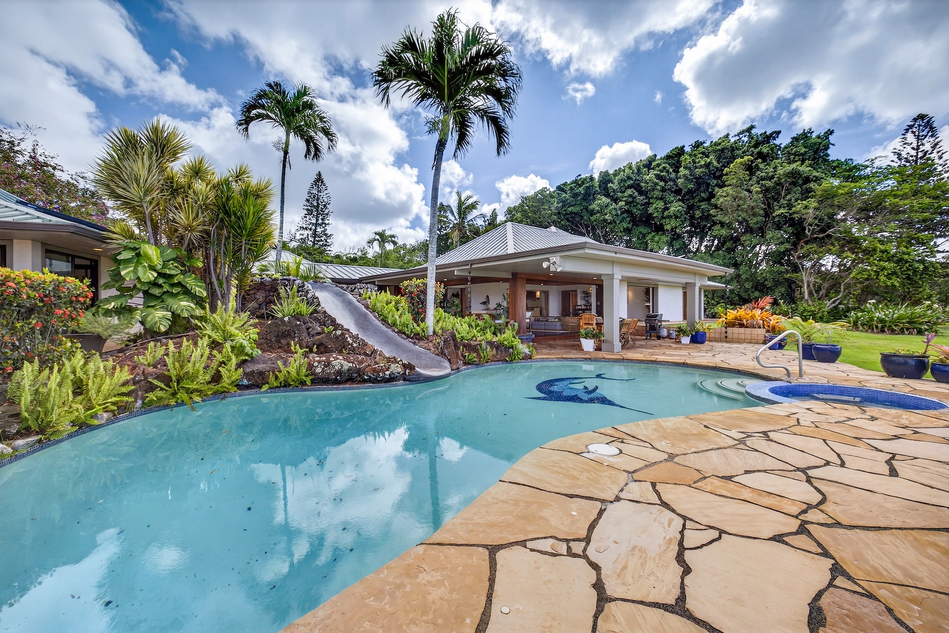 56-2878 Puakea Bay Road Kamuela, HI 96743 - Photo 17 of 25 a front view of a house with garden