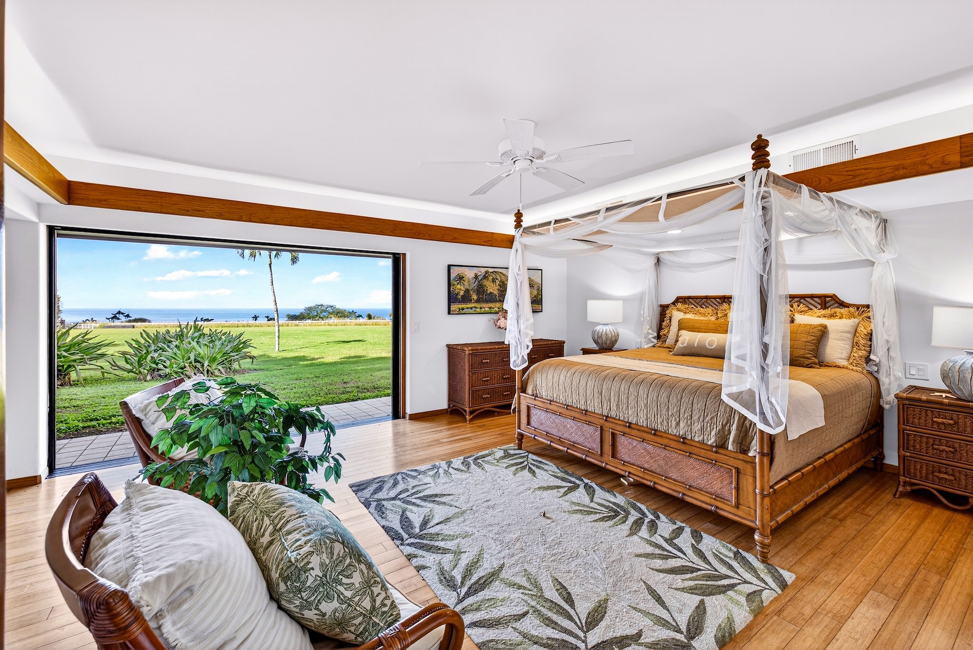 56-2878 Puakea Bay Road Kamuela, HI 96743 - Photo 18 of 25 a bedroom with a bed and large windows