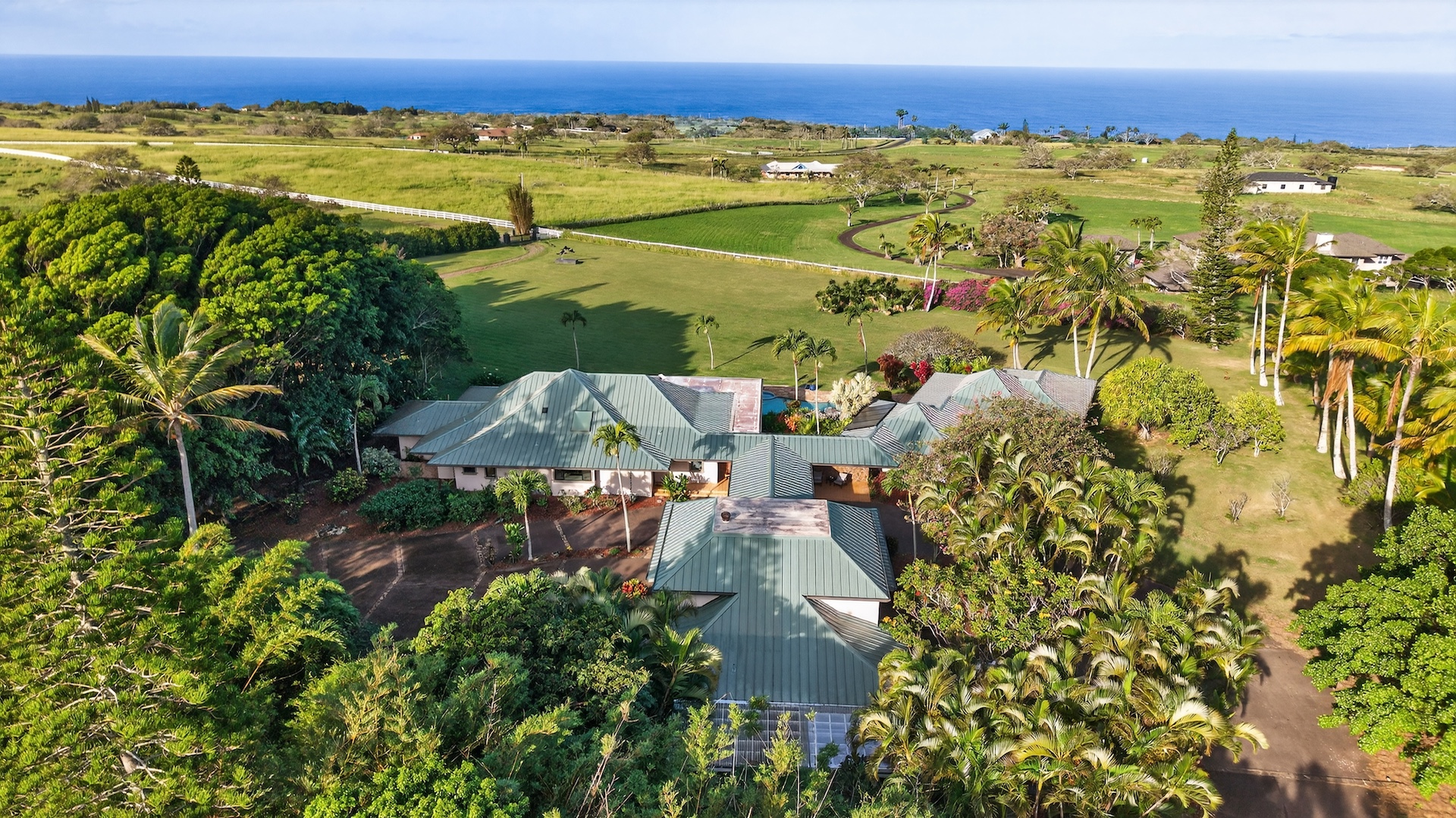 56-2878 Puakea Bay Road Kamuela, HI 96743 - Photo 2 of 25 an aerial view of residential houses with outdoor space and swimming pool