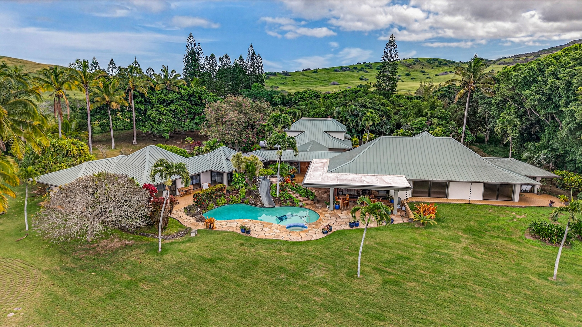 56-2878 Puakea Bay Road Kamuela, HI 96743 - Photo 4 of 25 a view of a house with a backyard and a patio