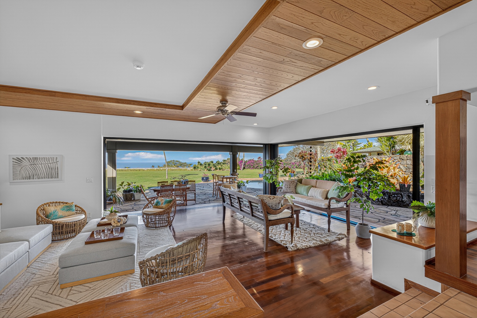 56-2878 Puakea Bay Road Kamuela, HI 96743 - Photo 7 of 25 a living room with fireplace furniture and a large window