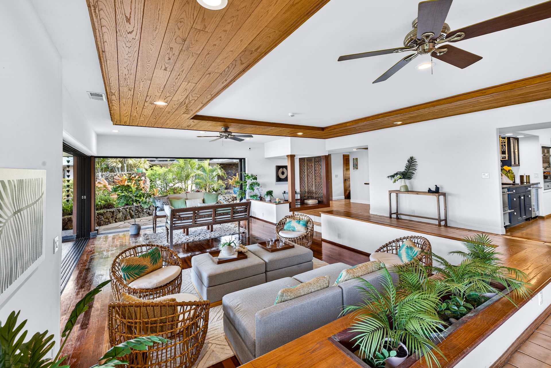 56-2878 Puakea Bay Road Kamuela, HI 96743 - Photo 9 of 25 a living room with patio furniture and a large window