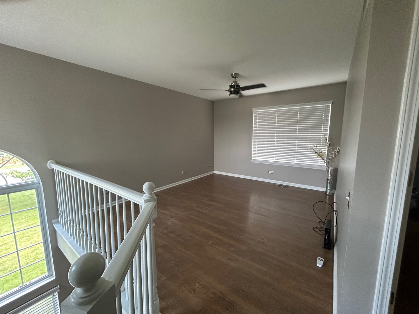 1561 Spaulding Road Bartlett, IL 60103 - Photo 16 of 25 a view of empty room with wooden floor and fan
