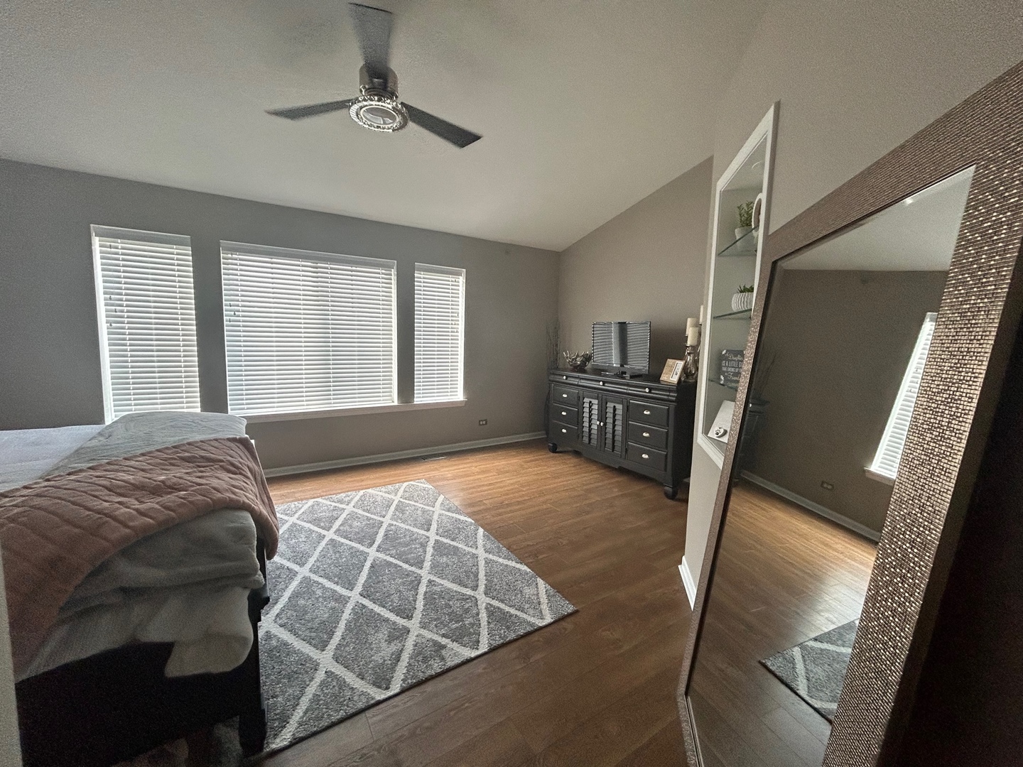 1561 Spaulding Road Bartlett, IL 60103 - Photo 20 of 25 a bedroom with a bed and dresser