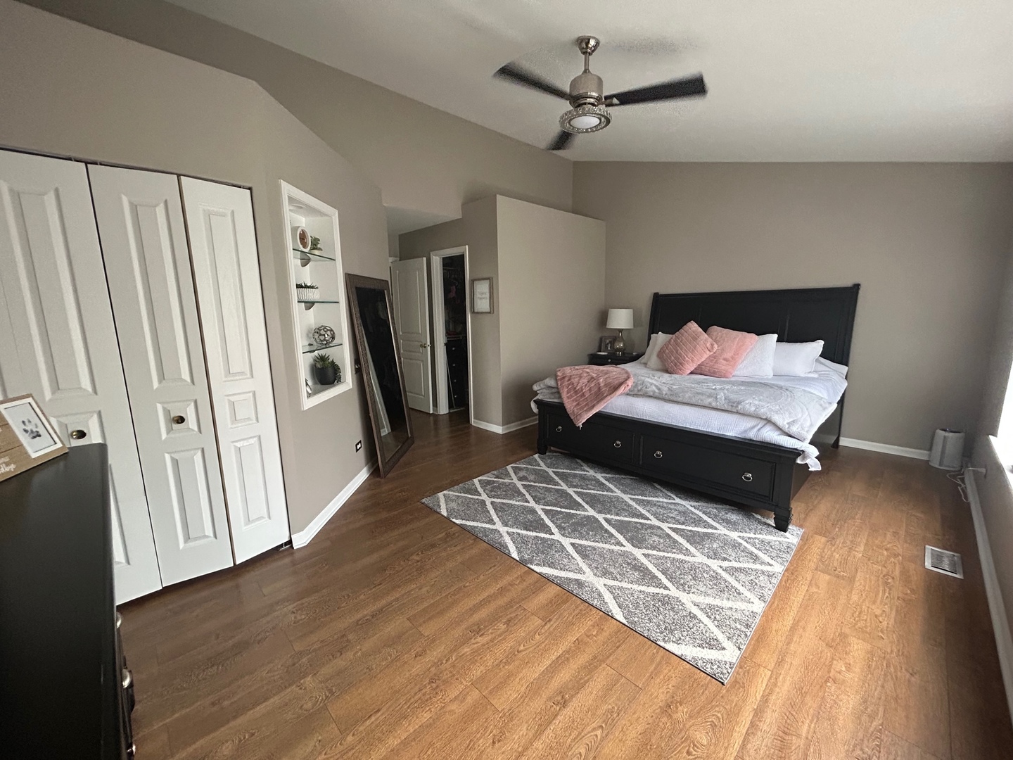 1561 Spaulding Road Bartlett, IL 60103 - Photo 21 of 25 a bedroom with a bed and a wooden floor
