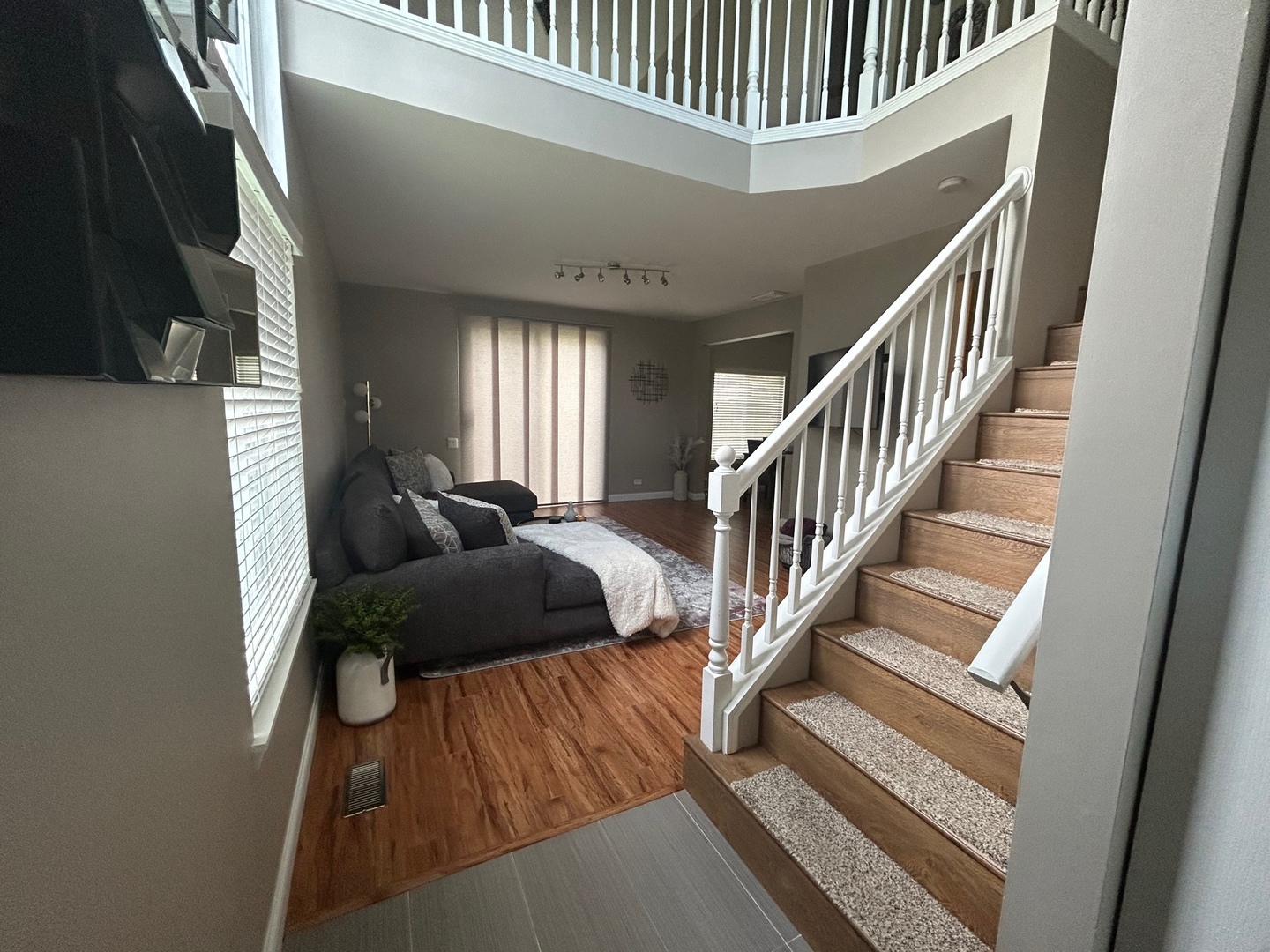 1561 Spaulding Road Bartlett, IL 60103 - Photo 5 of 25 a view of entryway and hall with wooden floor